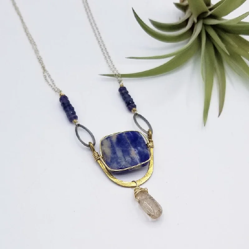 SODALITE SQUARE SET IN A BRASS "U" WITH RUTILATED QUARTZ DROP NECKLACE